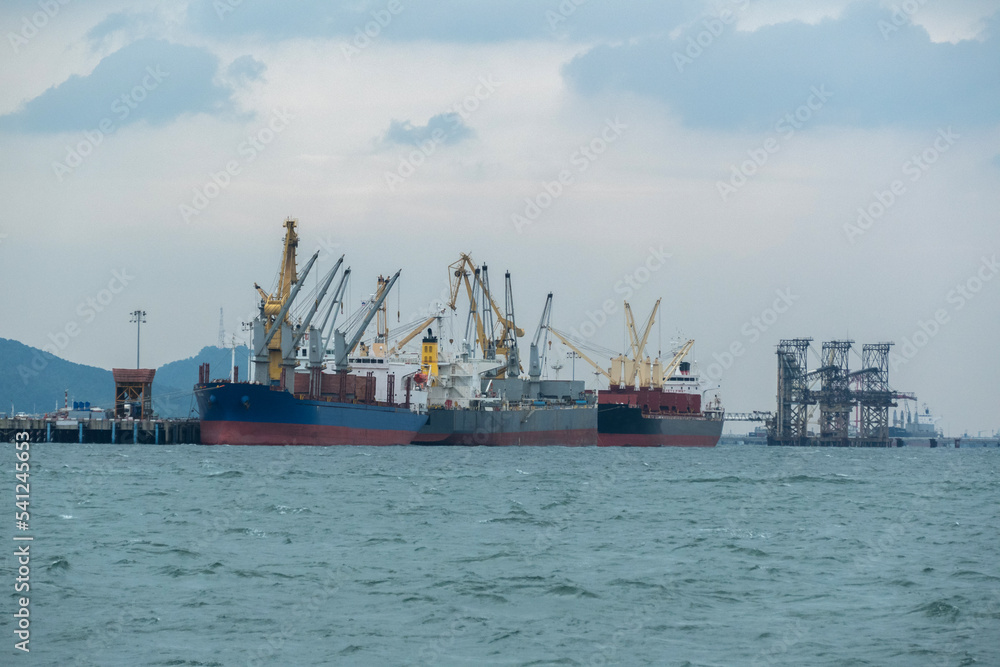 Cargo ship in Gulf of Thailand, is a shallow inlet in the southwestern South China Sea, bounded between the southwestern shores of the Indochinese
