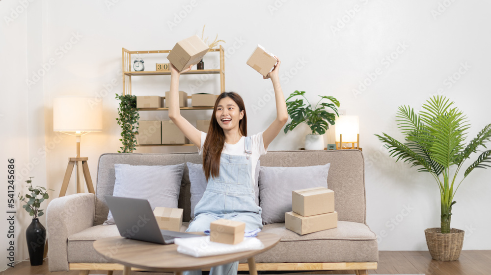 Small business owners or SMEs doing business related to selling and shipping online, New business style for young people working at home and owning businesses, Packing box, Sell online concept. Small business owners or SMEs doing business related to selling and shipping online, New business style for young people working at home and owning businesses, Packing box, Sell online concept.