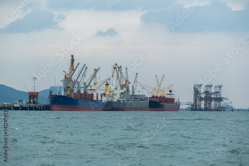 Cargo ship in Gulf of Thailand, is a shallow inlet in the southwestern South China Sea, bounded between the southwestern shores of the Indochinese