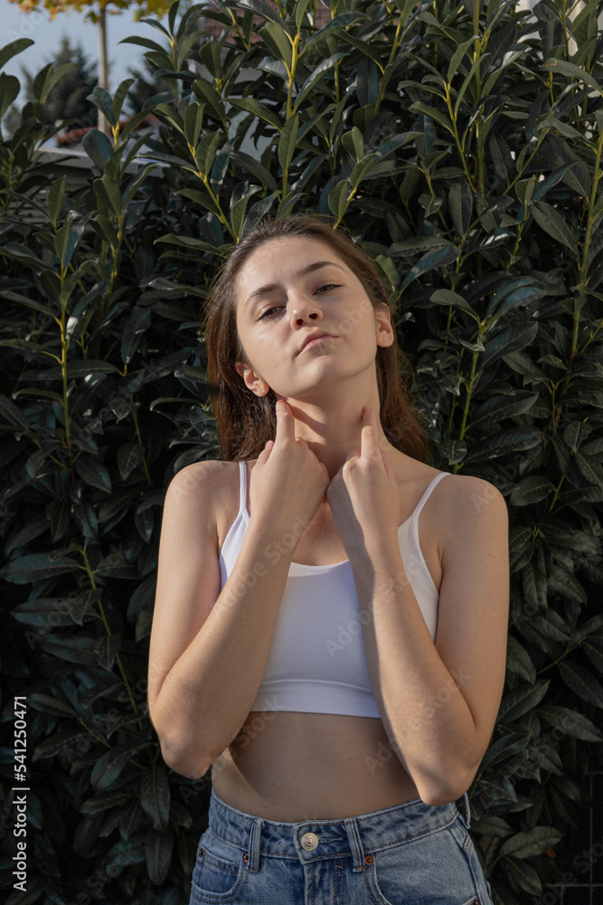 Portrait of a self-confident girl posing for a fashion gloss, advertising, branded stores
