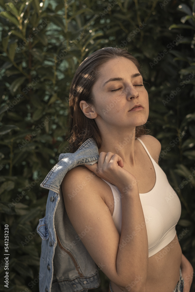 Fototapeta premium Portrait of a self-confident girl posing for a fashion gloss, advertising, branded stores
