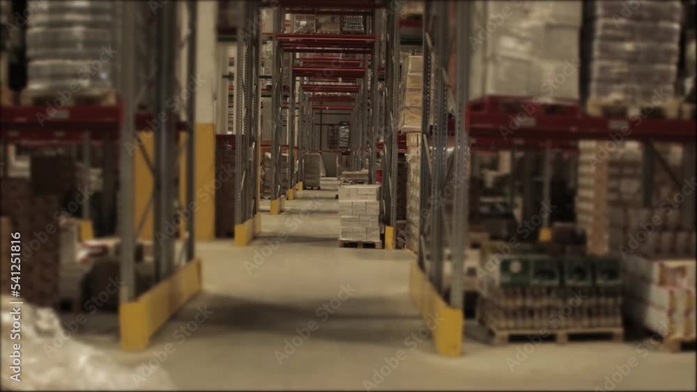 A new warehouse with racks for storing things and products in bags and boxes. Business, logistics. A new warehouse with racks for storing things and products in bags and boxes. Business, logistics.