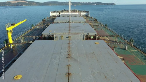 Deck with holds of a sea dry-cargo vessel.