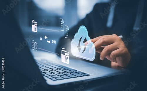 Cloud technology concept Global network of metaverse systems concept, Man hand touch data with internet cloud technology and File Transfer backup copy,Global business  Internet for Telecommunication photo