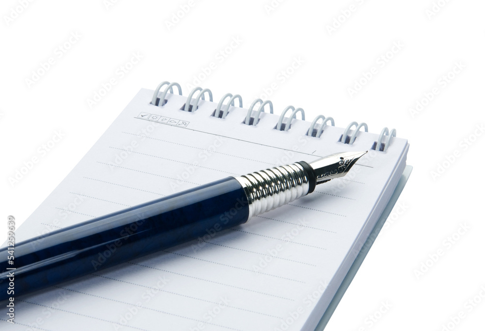 Pen on notebook, isolated on white background. Pen on notebook, isolated on white background.