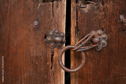 The shape of the traditional Korean door handle is original and beautiful The lock is open.