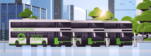 electric buses charging parking at the charger station with a plug in cable electrified transportation e-motion EV management