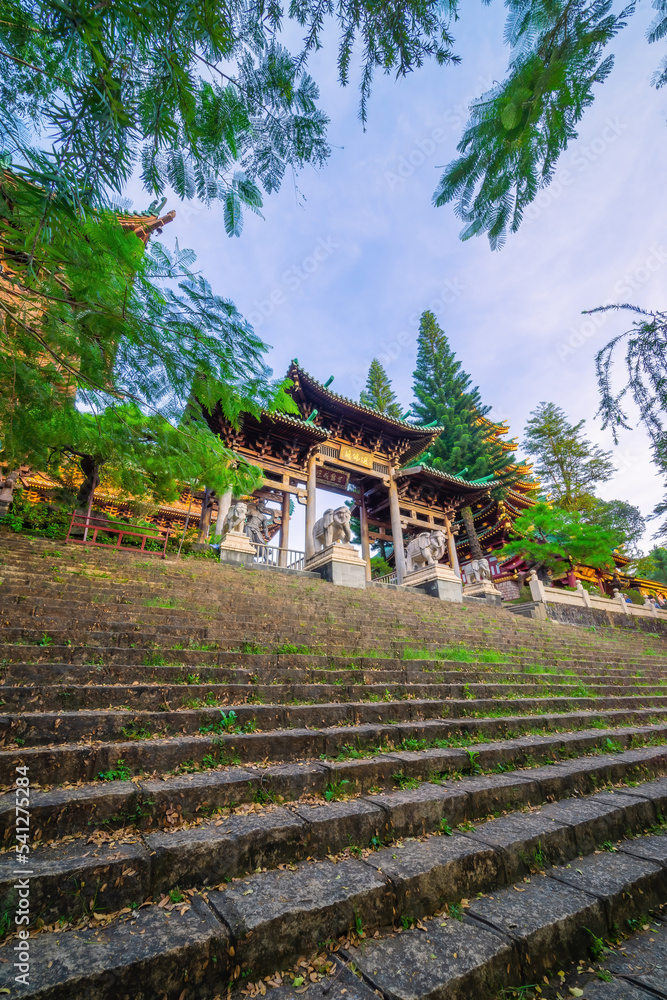 Obraz premium view of Minh Thanh pagoda, a majestic Buddhist architectural structure in Pleiku city, Gia Lai province, Vietnam, text in photo mean peace, compassion, forgiveness. Travel concept