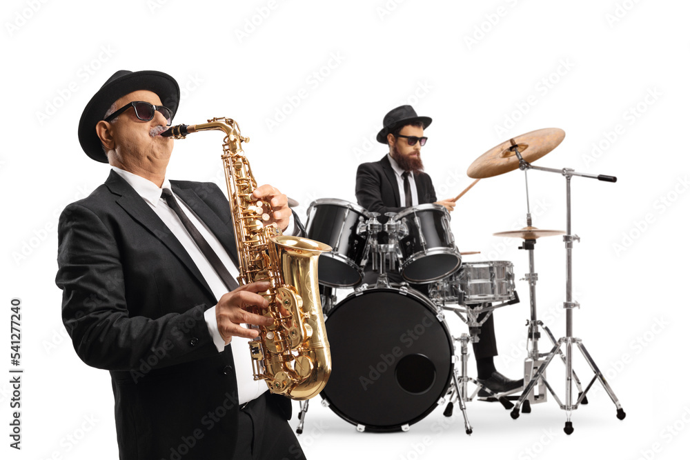 Fototapeta premium Man playing a saxophone and a drummer performing