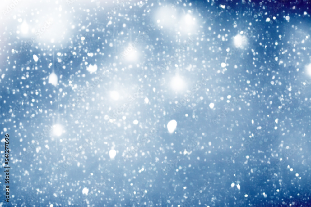 Falling snow. snowfall. Blurred. Abstract festive Christmas background. Winter holiday texture.