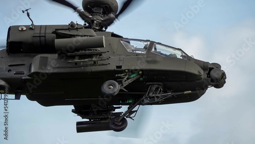 close-up full side on view of ZM707 British army Boeing Apache Attack helicopter (AH-64E ArmyAir606) flying al very low level