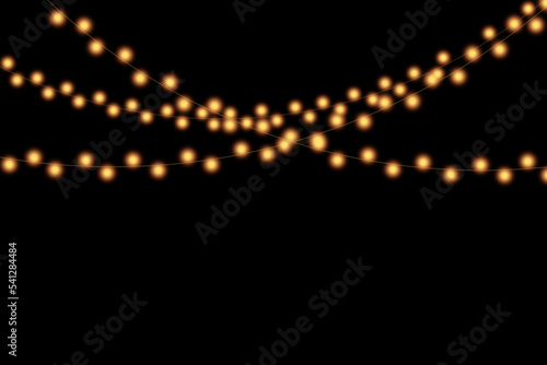 Abstract Christmas lights on black background. Glowing light bulb garland,