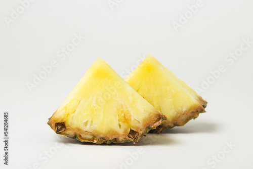 Slice of pineapple on a white background. Tropical Fruit