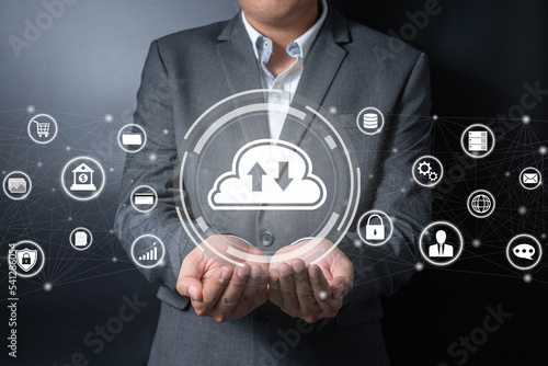 Double exposure of close up businessman holding cloud icon on balck and gray background