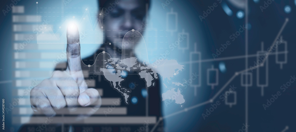 Fototapeta premium financial graph and stock business analysis,businessman and world map