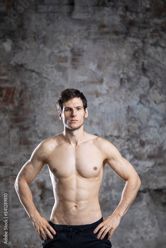 Portrait of a confident shirtless bodybuilder.