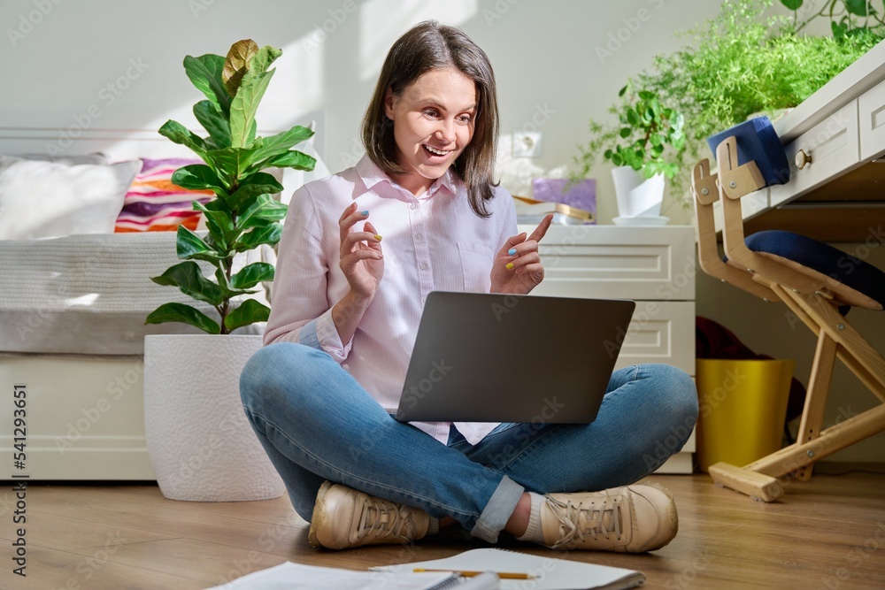 Beautiful young woman using laptop for video chat Beautiful young woman using laptop for video chat