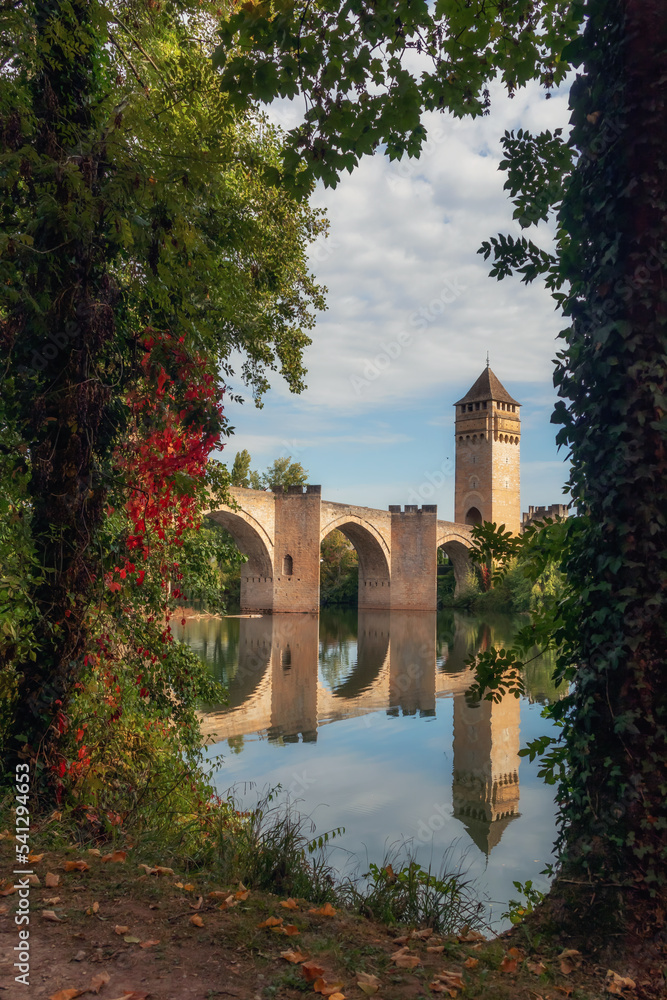 The Pont Valentre  is a 14th-century six-span fortified stone arch bridge crossing the river Lot to the west of Cahors, in France. It has become a symbol of the city.