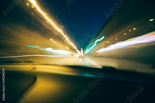 Long exposure to city streets from the car windows, blur lights