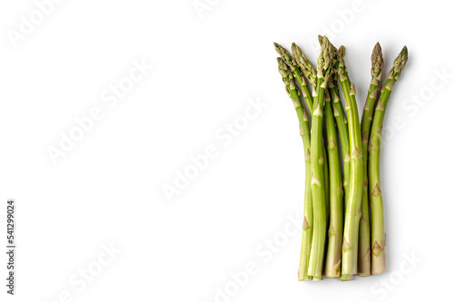 Fresh green asparagus isolated on white background. Top view, copy space, space for text.