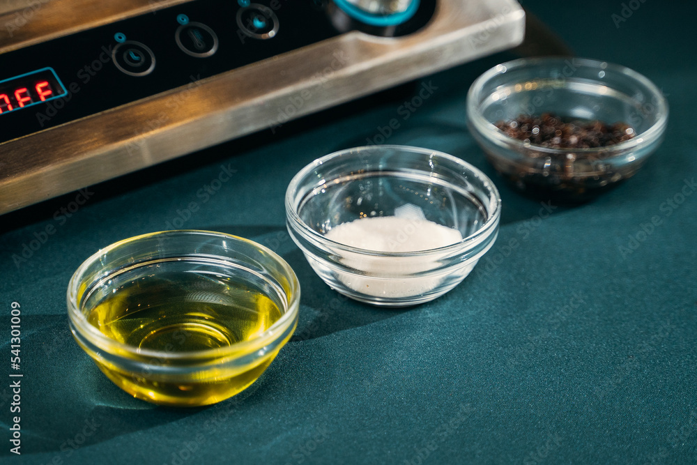 ketchup, sauce, oil in bottles, in separate containers ketchup, sauce, oil in bottles, in separate containers