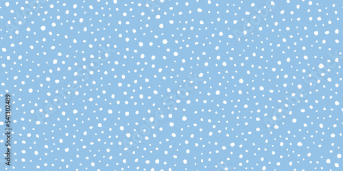 Hand drawn falling snow seamless pattern, uneven round fading chaotic dots, spots, flakes. Sketched white snowflakes on sky blue repeating snowfall background. 