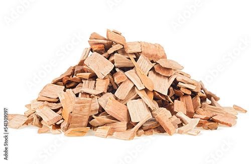 Pile of wood chips from alder tree. Wooden chips for smoking meat and fish isolated on a white background. photo