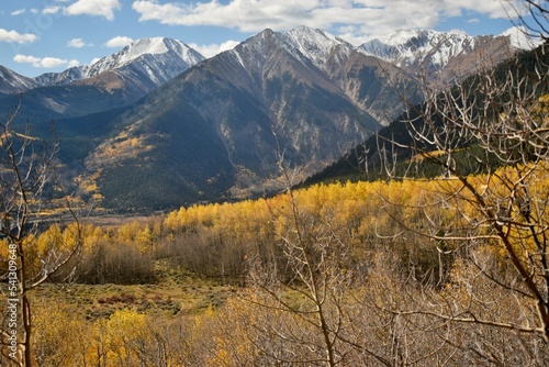 Autumn colors and snow-capped mountain peaks