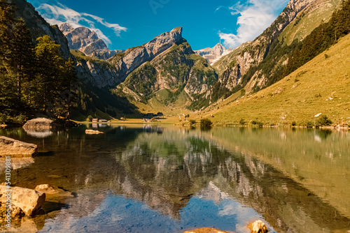 The Saentis summit in the background with reflections at the famous Seealpsee lake  Innerrhoden  Appenzell  Alpstein  Switzerland