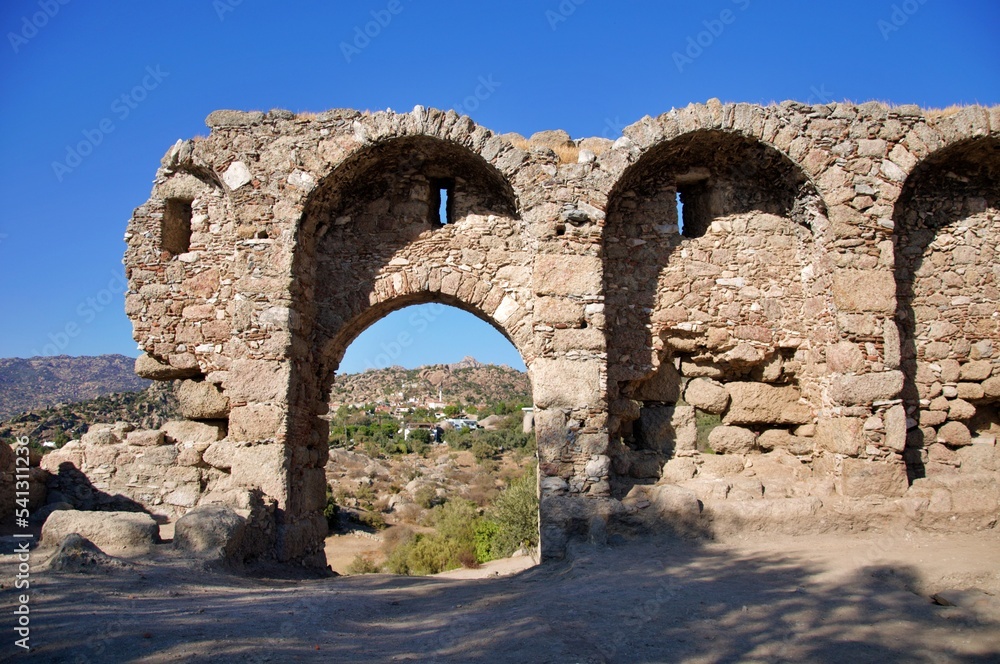 Lake castle with ancient fortifications in Kapikiri village on Bafa lake in Mugla, Turkey