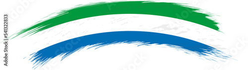Flag of Sierra Leone in rounded grunge brush stroke. photo
