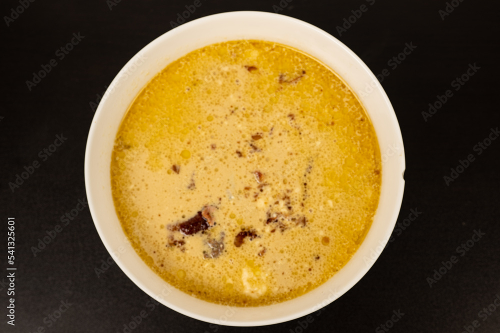 Cheese Burger Soup with ground beef cheese and a white bowl Cheese Burger Soup with ground beef cheese and a white bowl