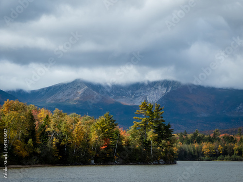 Baxter Peak view surrounded by moody clouds from Lake Katahdin, Maine, in early fall photo