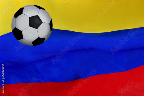 Football flying over the country flag of Colombia 