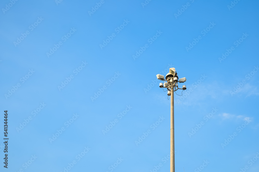 lamp post against blue sky