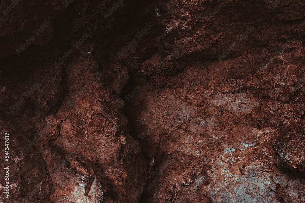 Fototapeta premium Brown texture. Stone background. Rock texture. Grunge Rough structure. Abstract texture. Rock surface with cracks. Rock pile. Paint spots wall. Wall marble.
