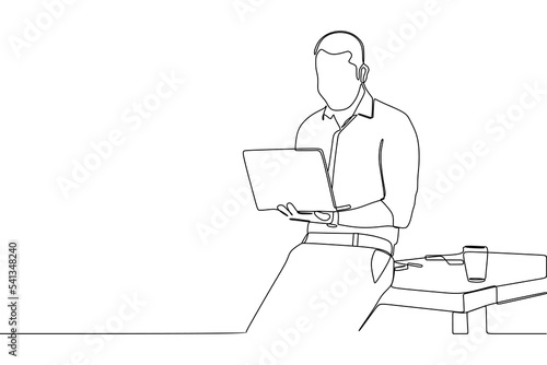 Continuous line drawing of businessman wearing a white shirt sitting at a desk in the office
