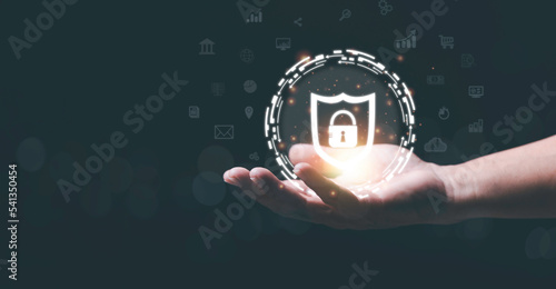 online security protection, cyberspace technology. authenticate To log in, verify your privacy. with password, key icon in human hand Demonstrates cyber security that have been properly approved