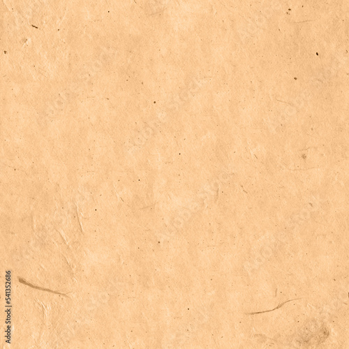 Seamless Kraft Paper Texture. Rough, grainy, beige material. Minimalistic background for design, advertising, 3d. Empty space for inscriptions. A cardboard sheet for packing the parcel.