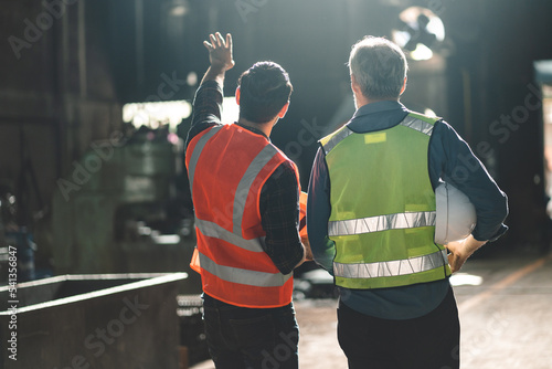 industrial factory with men...