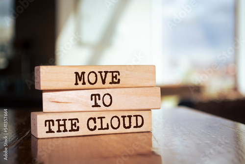 Wooden blocks with words  Move to the Cloud .