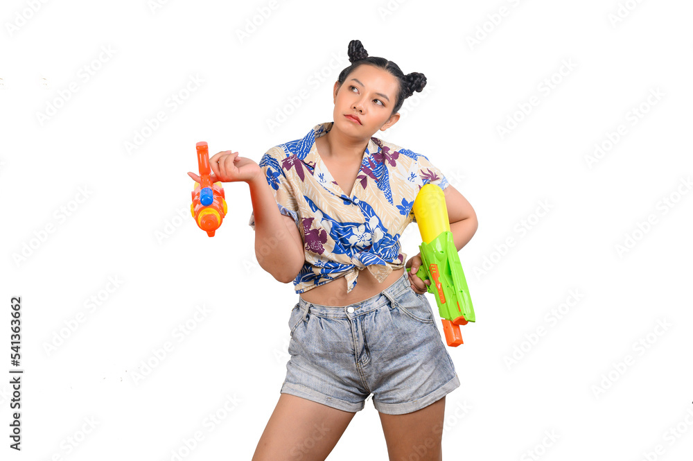 Portrait smiley woman in Songkran festival with water gun Portrait smiley woman in Songkran festival with water gun