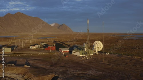 arctic sunset at Isfjorden Radio Station in Spitsbergen showing Satellite and Antenna Equipment photo