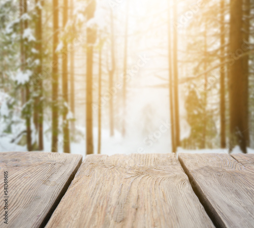 Empty wooden table in winte...