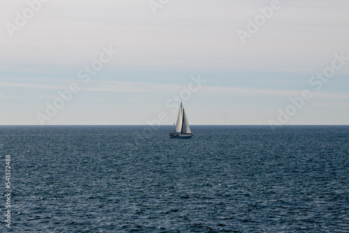 A sailboat in the An Diego ocean.