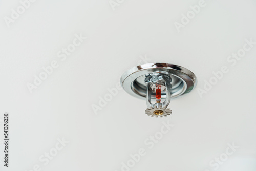 Canvas Print Fire Sprinkler detector mounted on roof in home or apartment