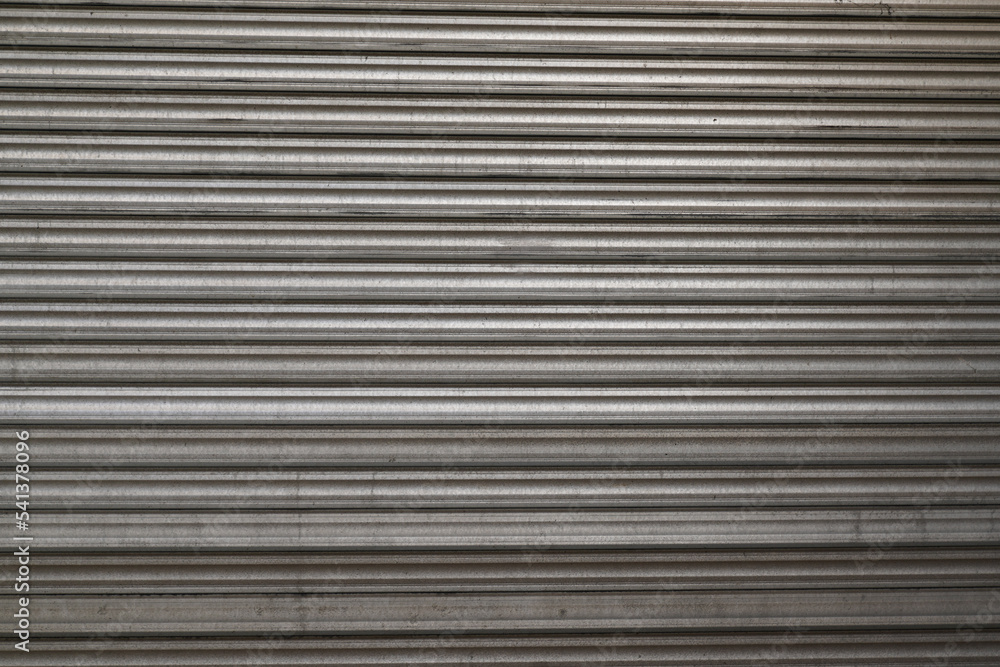 steel rustic grey texture vertical silver metallic curtain shuttle rolling shutter gray background steel rustic grey texture vertical silver metallic curtain shuttle rolling shutter gray background