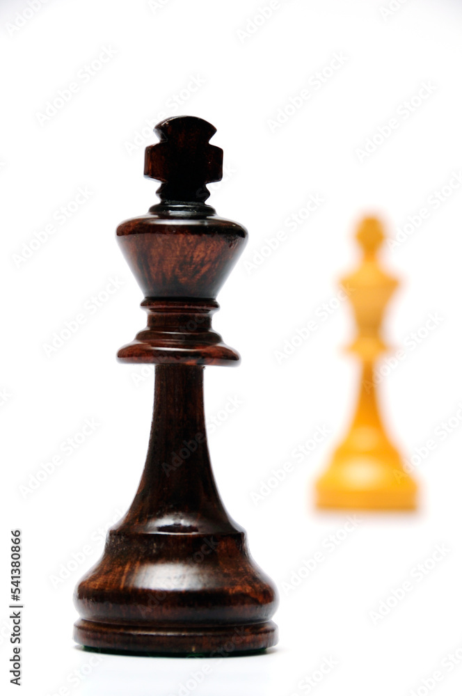 black chess king confronting white chess king black chess king confronting white chess king