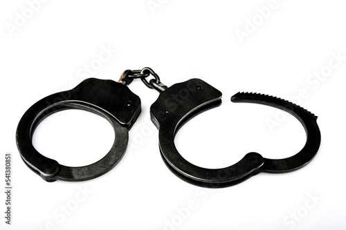 pair of police handcuffs isolated