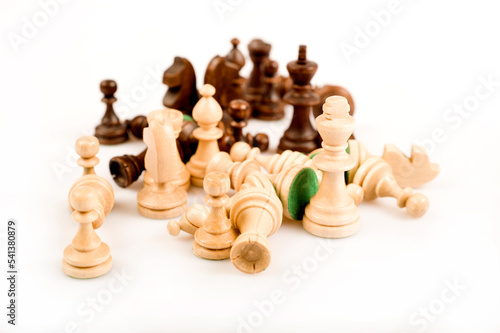 set of black and white chess pieces isolated